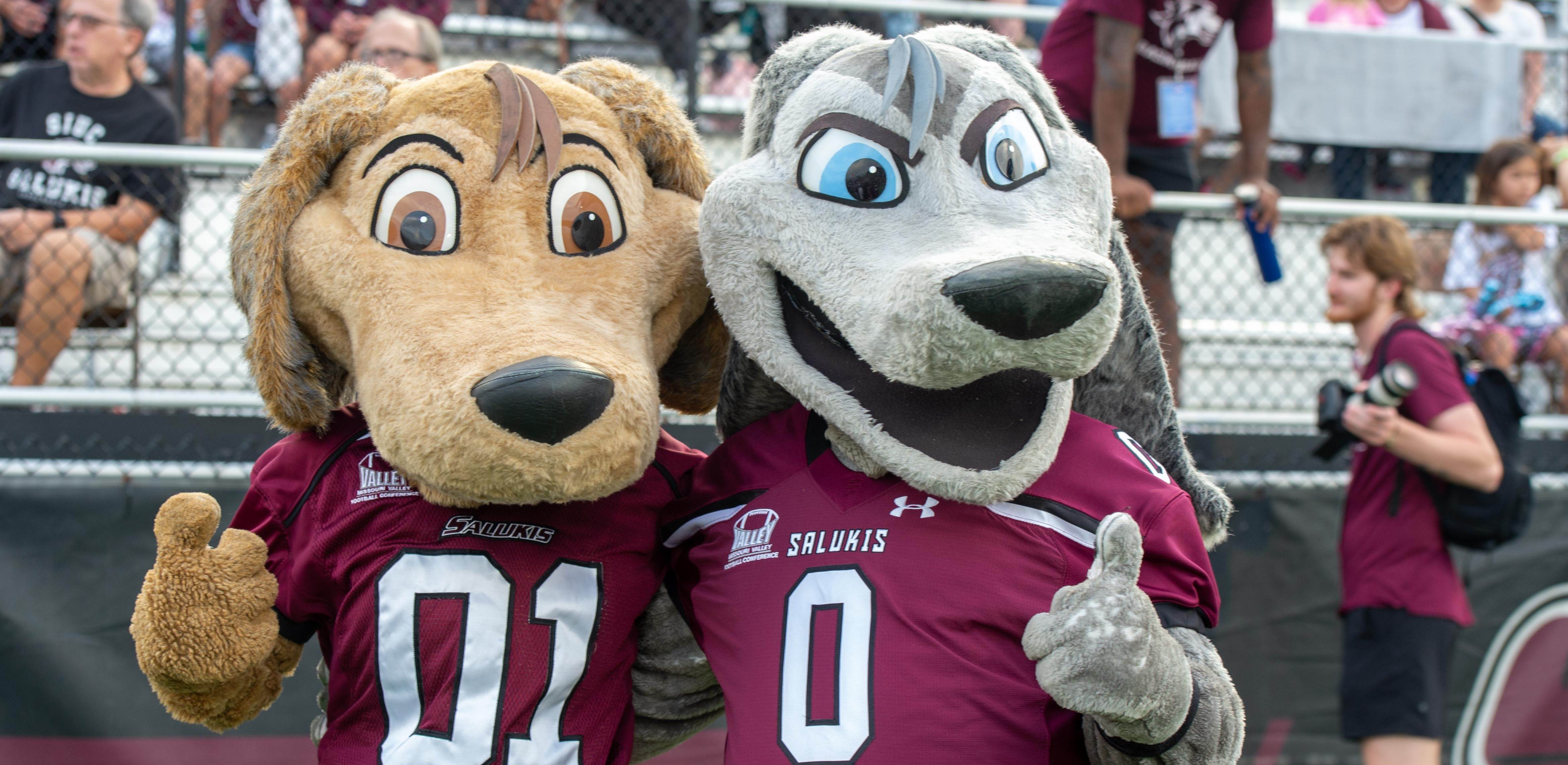 mascots with thumbs up